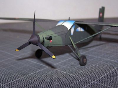 Pilatus PC-6 Turbo-Porter
Avion de l'armÃ©e de l'air Suisse. C'est la mÃªme maquette de chez PTA. La planche originale est retravaillÃ©e sous Photoshop / 300 dpi pour une meilleure dÃ©finition. Les roues sont rÃ©alisÃ©es par tournage.
