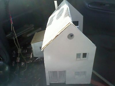 Maison face nord
On apperÃ§oit la bais coulissante qui est fonctionnelle ainsi que les fenÃªtres (qui souvre bien sÃ»r)

