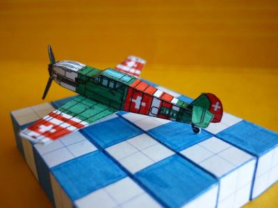 Messerschmitt Bf109E suisse
Bf109E d'Oliver Bizer coloriÃ© aux couleurs suisses. L'hÃ©lice, sa casserole et le train d'atterrissage sont des crÃ©ations perso.
Keywords: olli bf109