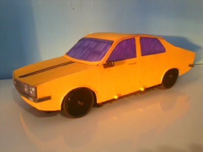 Dacia 1410 Sport - Vue avant en construction
Carrosserie montÃ©e sur le chÃ¢ssis attendant ses derniers Ã©lÃ©ments dont un bas de caisse avant et un rÃ©troviseur droit.
Keywords: Dacia 1410 Sport 1/16 en construction Renault 12 coupÃ© carrosserie