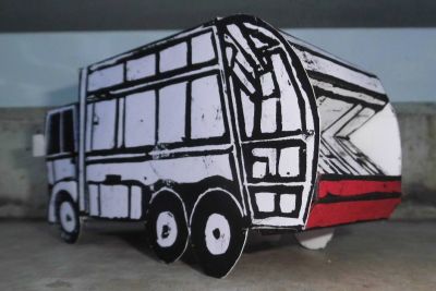 Heil Collectomat Mark II
maquette en papier realisée engravure sur linoleum d´un 
camion poubelle insperé du film "soylent green" , USA 1973
Keywords: Heil Collectomat Mark II