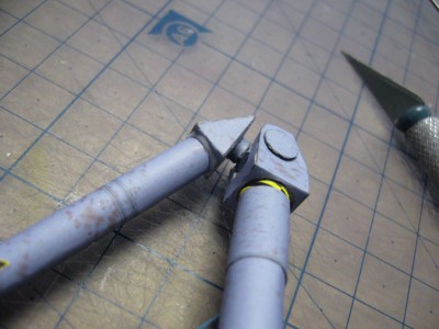 Avant bras collé sur le coude