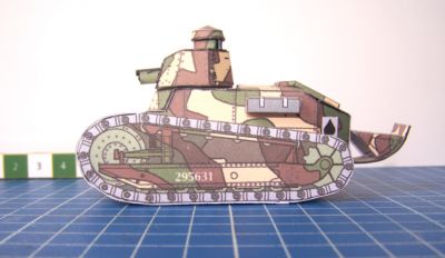 Char Renault FT-17
Le FT-17 vu de profil... ou l'on ne peut que remarquer que je n'ai pas masquÃ© le chant du papier... Le canon de 37 mm penche Ã  cause du poids de son tube. En fait, ce 'canon' ne porte qu' 800 mÃ¨tres, et encore fallait-il arrÃªter le char avant le tir. Ce n'est qu'une arme d'infanterie qui tire un tout petit obus explosif. Je regrette la trop grande hauteur du dÃ´me situÃ© au-dessus de la tourelle, c'est un peu moins haut en rÃ©alitÃ©.
Keywords: Char lÃ©ger FT-17