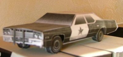 voiture des blues brother, sortie sur une imprimante nir et blanc du boulot
Ben oui, faut bien s'occuper des fois, suivant les postes... En mÃªme temps, lemodÃ¨le Ã©tait noir et blanc, domage cependant que Ã§a sorte en tons de gris sur ces imprimantes, mais je l'ai gardÃ©, je la trouve marrante, et elle fait partie de ma gÃ©nÃ¨se de modÃ©liste papier.
